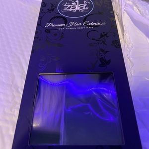 Zala Hair extensions they are tape ins. Ice queen blonde. They are 20in